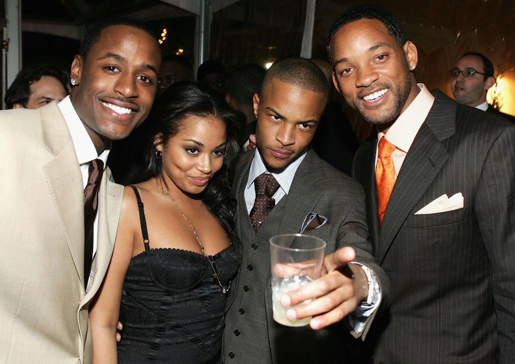 Actors Jackie Long, Lauren London, T.I. Will Smith pose the Premiere Of Warner Bros.