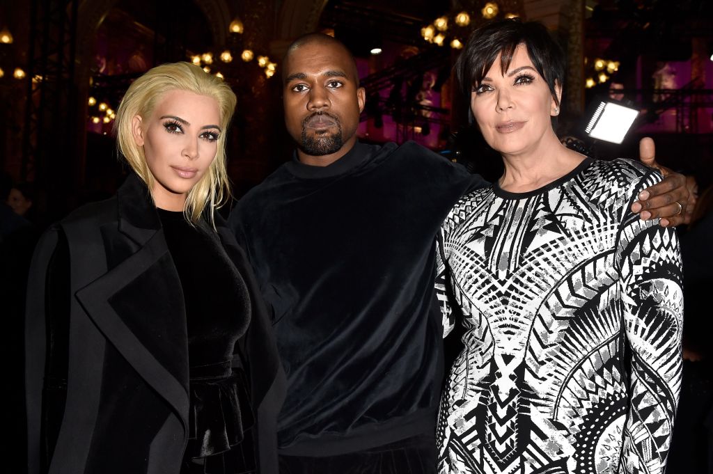 Kim Kardashian, Kris Jenner, and Kanye West attend Balmain show during Paris Fashion Week