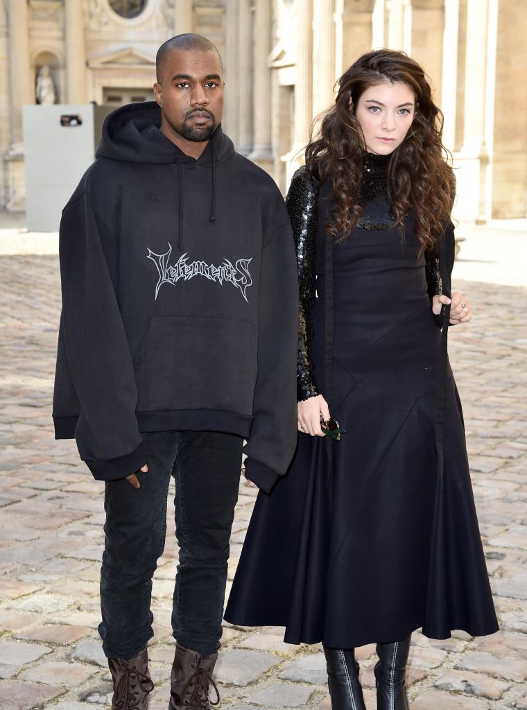 Kanye West and Lorde were matching in all black everything as they attended the Christian Dior Fashion Show in Paris. The pair looked thoroughly thrilled to be in each other's company.