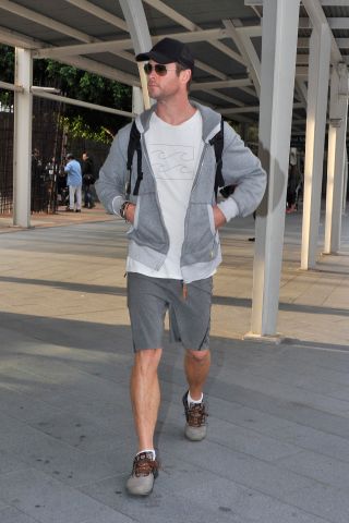 Chris Hemsworth arrives at Sydney international airport