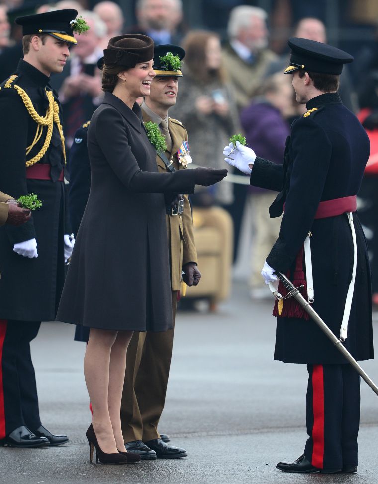 Prince William better watch out. A solider made Kate Middleton laugh at the St. Patrick's Day parade.