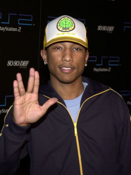 P. Williams World on X: #Throwback @Pharrell riding his chopper bicycle  wearing a @NeRdArMy cap [2003] #pharrell #nerd #startrak   / X