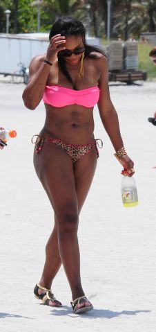 Tennis great Serena Williams takes a dip in the ocean