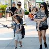 Kim Kardashian & Kourtney Kardashian take their kids to the movies