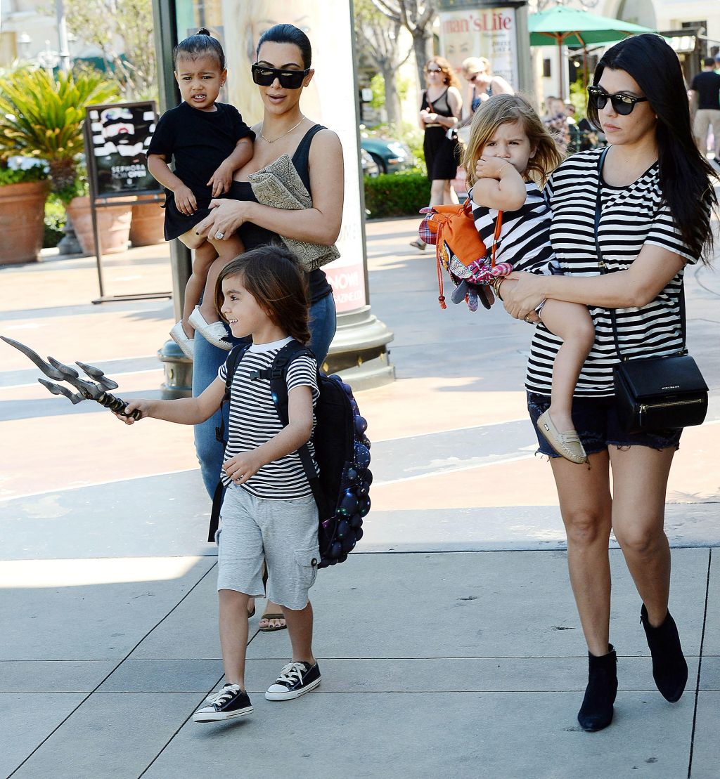 Kim Kardashian & Kourtney Kardashian take their kids to the movies