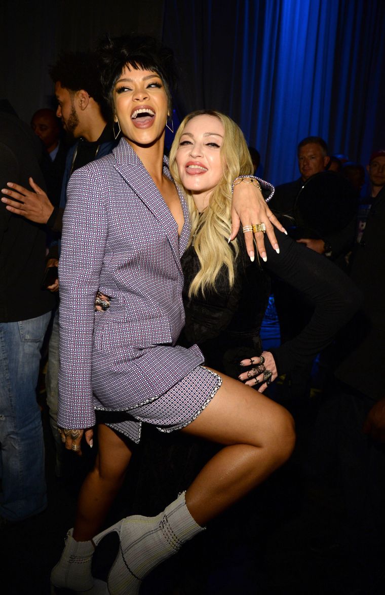Rihanna shows some love to Madonna.