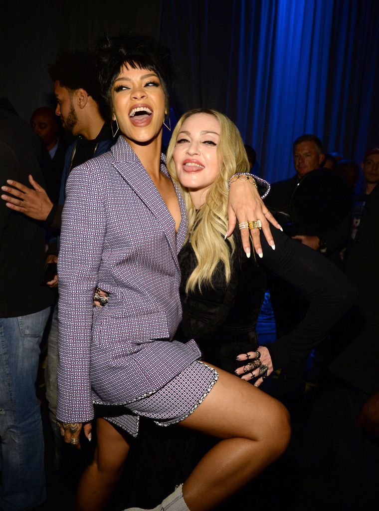Rihanna shows some love to Madonna.