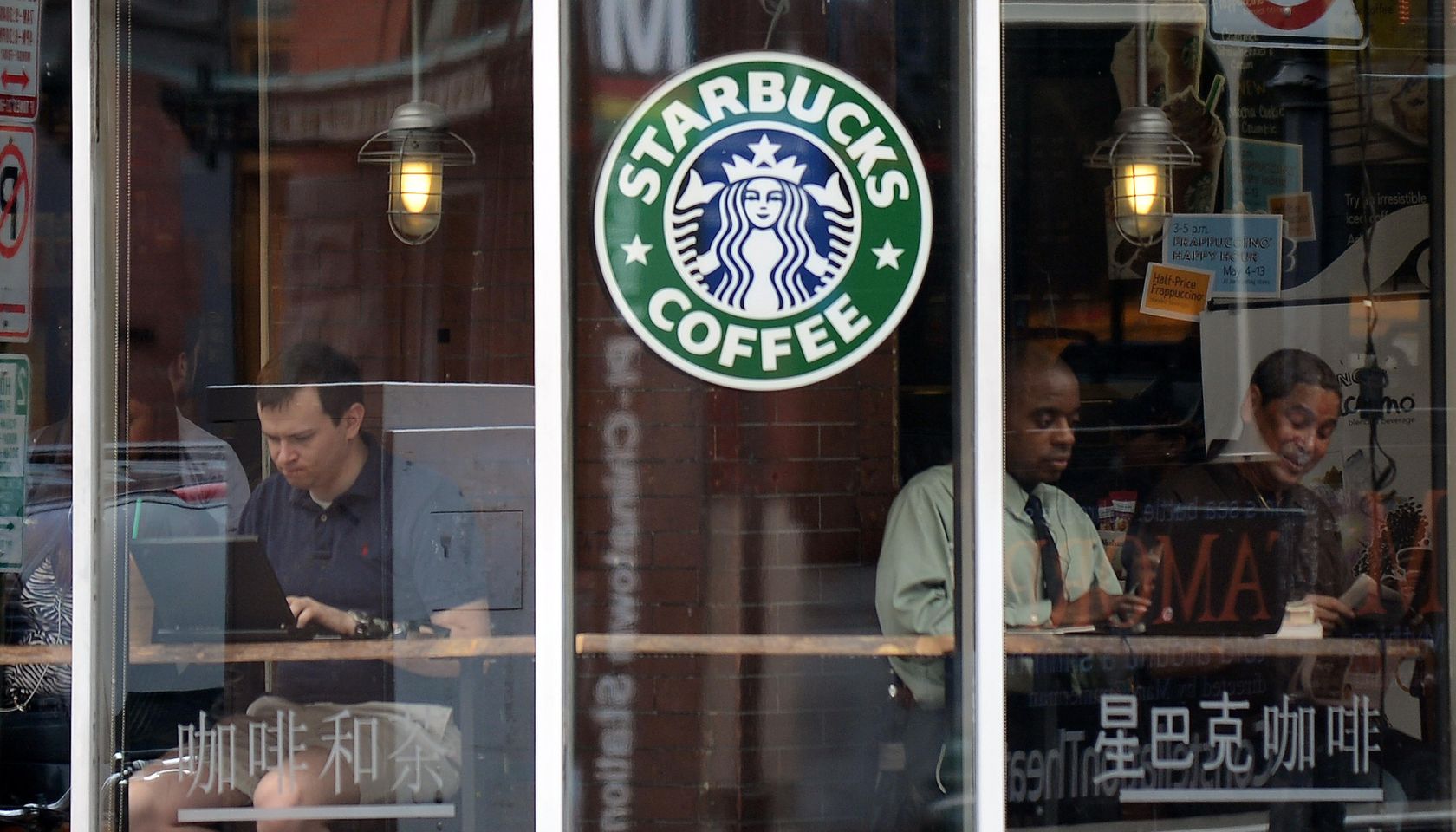 People use their laptop computers at a s