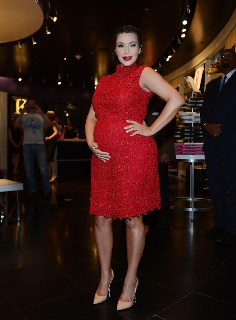 Kim Kardashian’s pregnancy style caught a lot of criticism, but she still managed to flash a smile.