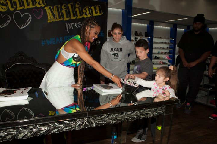 Christina Milian and fans at Shiekh Shoes in Hollywood to promote her new fashion line, We Are Pop Culture.