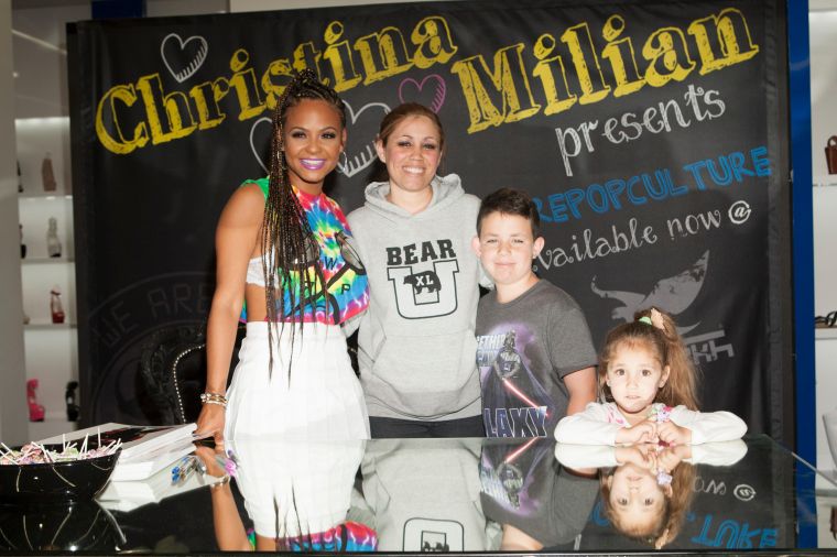 Christina Milian and fans at Shiekh Shoes in Hollywood to promote her new fashion line, We Are Pop Culture.