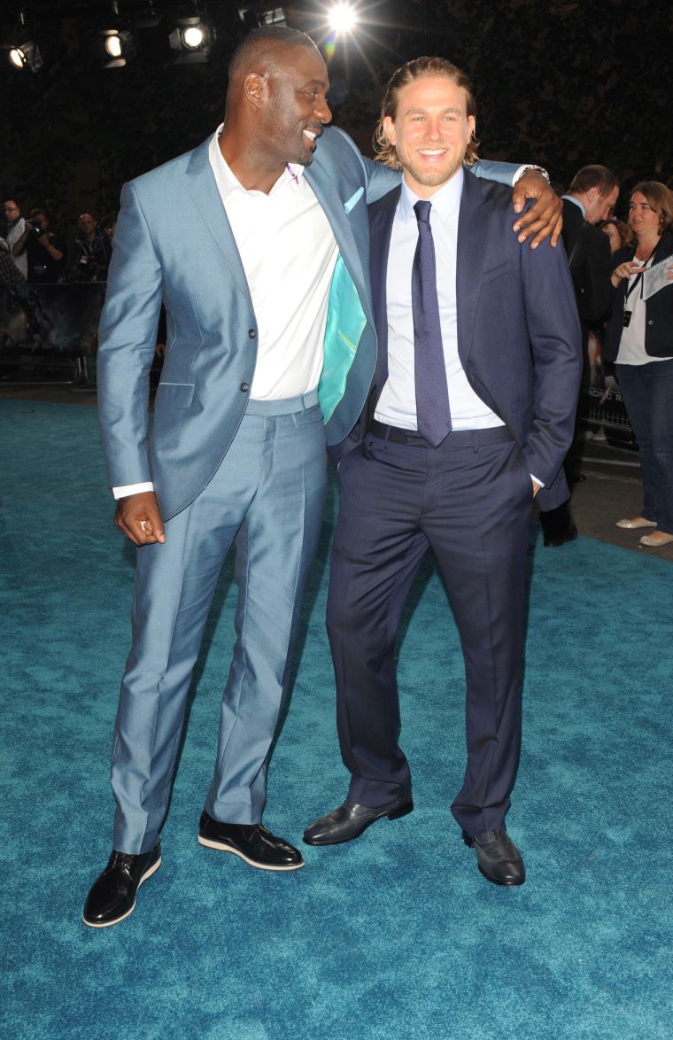 Idris Elba with Charlie Hunnam.