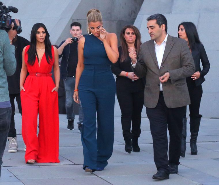 Khloe Kardashian wipes tears as she leaves the Armenian Genocide memorial with Kim and cousins