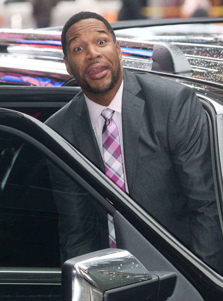 Michael Strahan departs 'Good Morning America' at the ABC News studios in Times Square in New York.