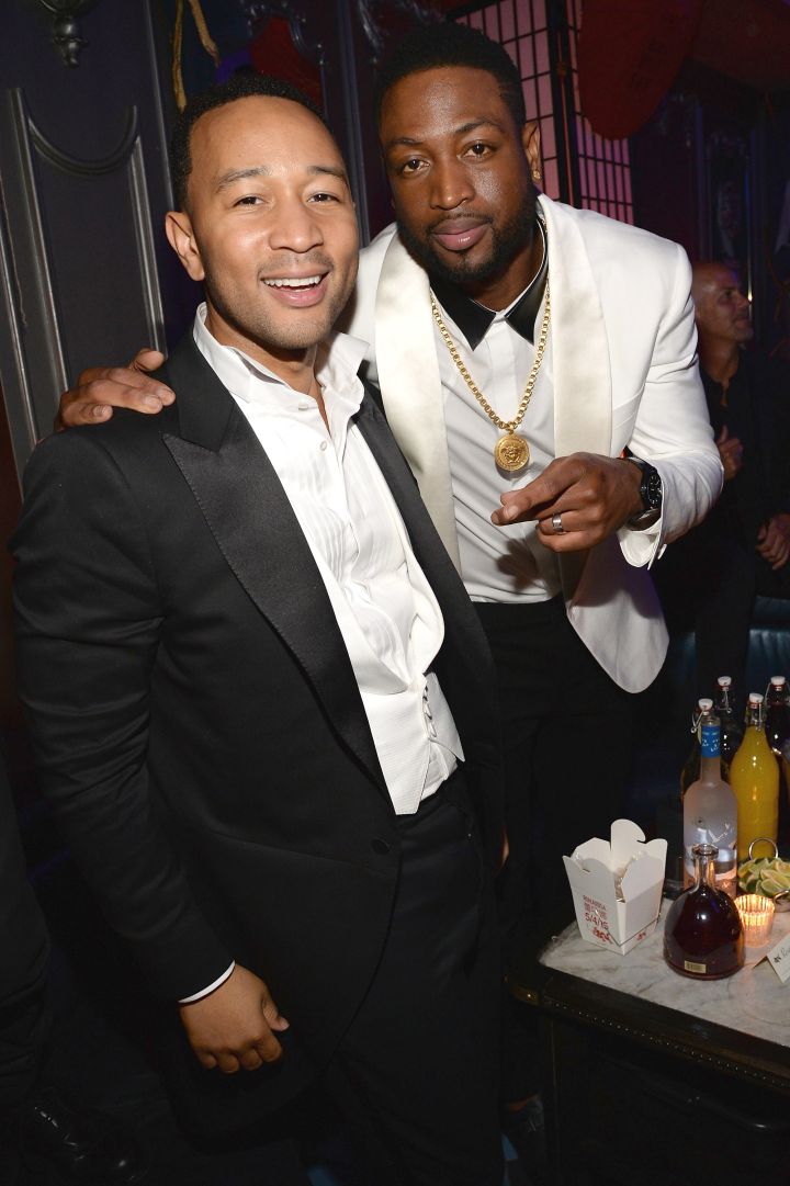 Bros John Legend and D-Wade flash smiles for the camera over drinks and Chinese food at a Met Gala after party.