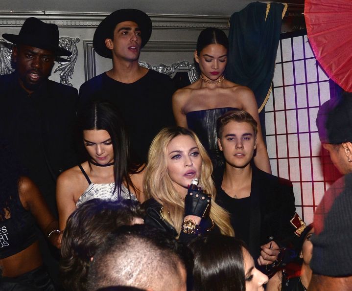 Kendall Jenner and Justin Bieber kick it with Madonna at Up And Down during Rihanna’s Met Gala after party.