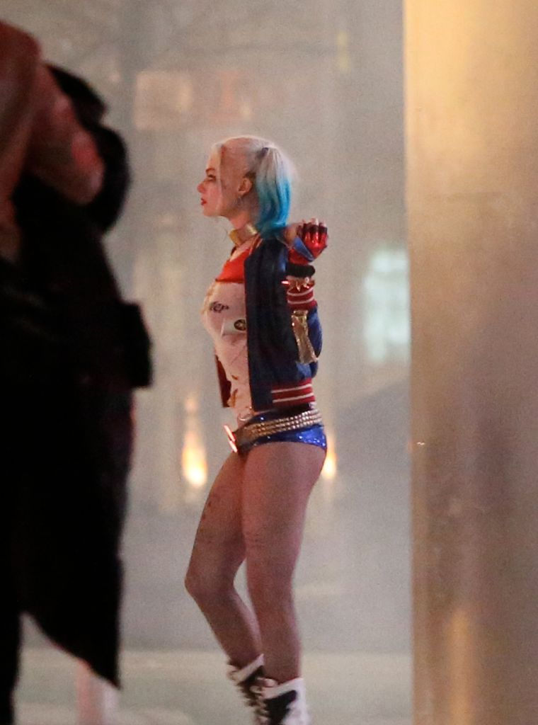 Margot Robbie is giving her Harley Quinn outfit a real workout during the filming of "Suicide Squad" in Toronto.