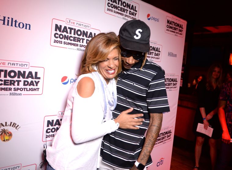 Hoda Kotb and Wiz Khalifa share jokes on the carpet during the Live Nation National Concert Day At Their 2015 Summer Spotlight Event Presented By Hilton at Irving Plaza.