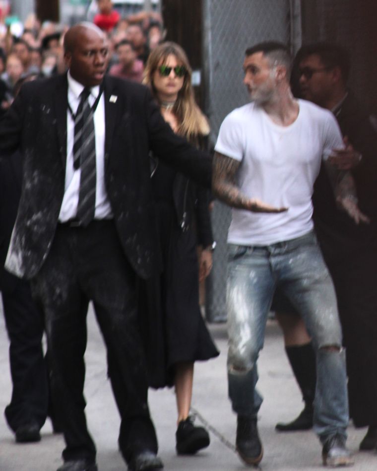 Adam Levine had a scary moment after being flour/sugar bombed while leaving a recording of "Jimmy Kimmel Live."