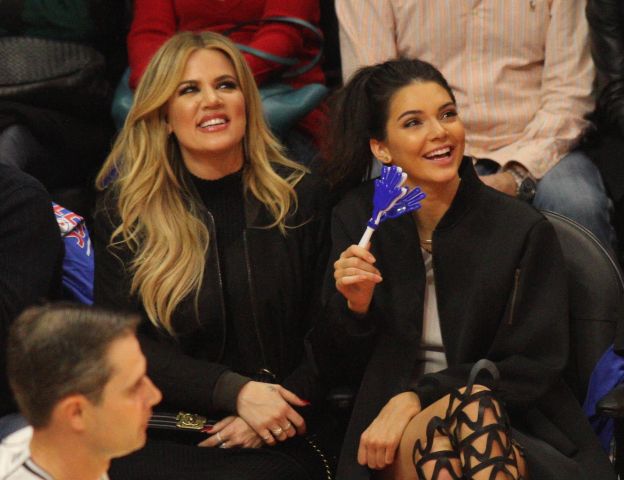 Khloe Kardashian and Kendall Jenner at Clipper basketball game in Los Angeles