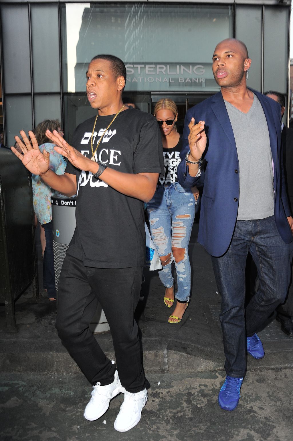 Jay Z steps up to defend his bodyguard after he was hit by a paparazzi outside of NYC offices