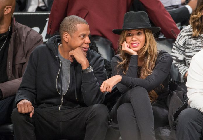 Jay Z and Beyonce at basketball game