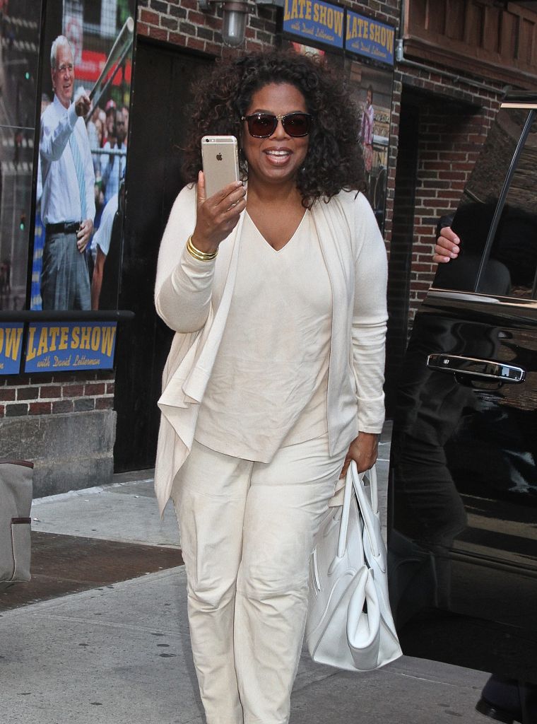 Just Oprah paparazzi-ing the paparazzi as she heads to "The Late Show With David Letterman" taping in NYC.