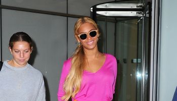 Beyonce rocking orange skirt and pink shirt in New York