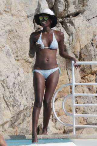 Lupita Nyong'o poolside in France