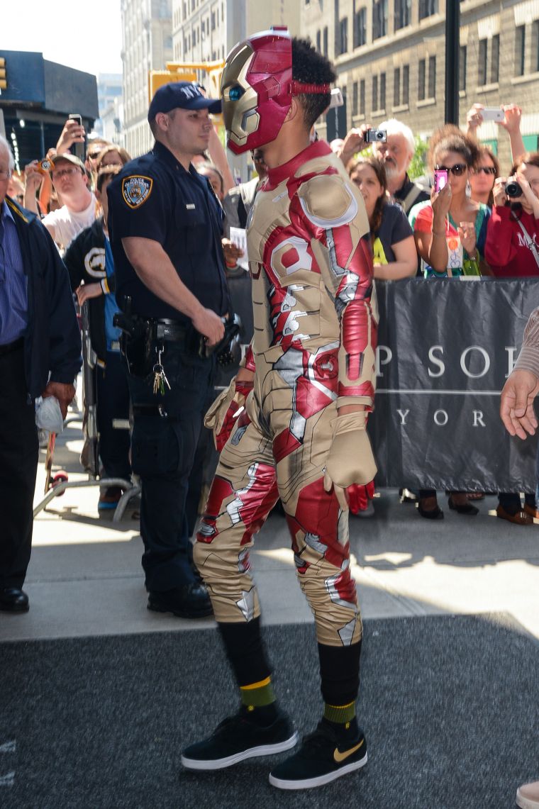 Jaden Smith walking around dressed as Iron Man.