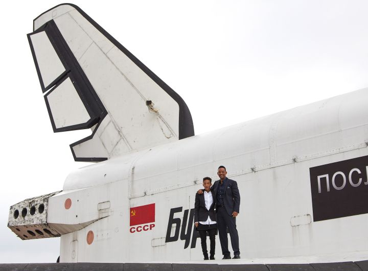 Jaden Smith standing on a Russian spaceship’s wing.