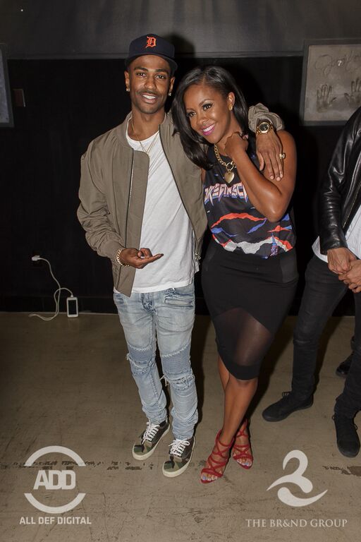 Big Sean kicking it with head woman in charge – Miss Diddy.