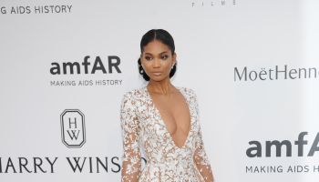 Celebrities attend the amfAR event in Cannes, France