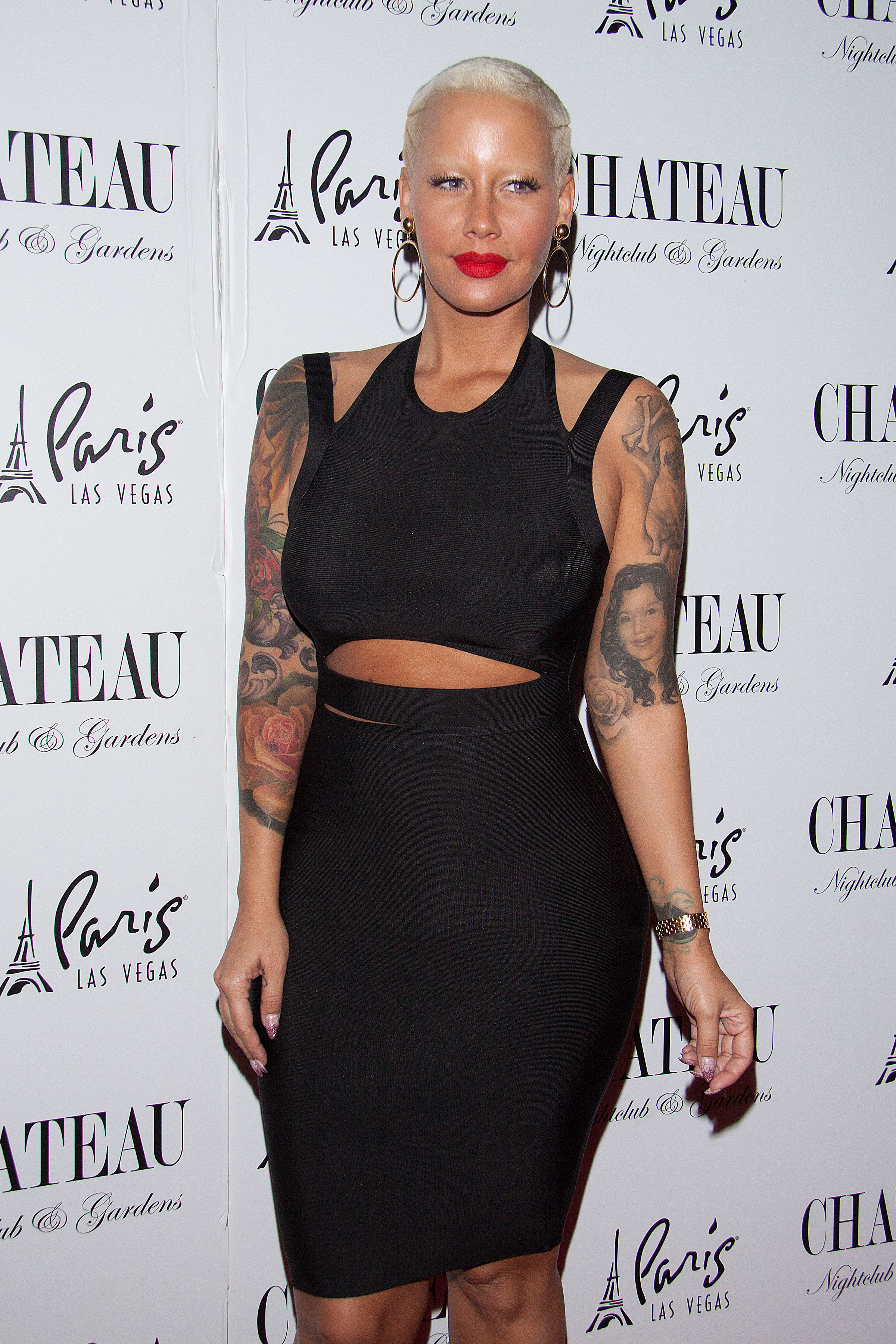 Amber Rose alters Wiz Khalifa tattoo to look like Slash  Daily Mail Online