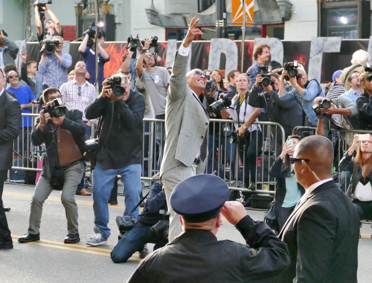The Rock gave a big shout out to a fan up high as he was heading into the premiere of Warner Bros. Pictures' 'San Andreas' at TCL Chinese Theatre in Hollywood, California.
