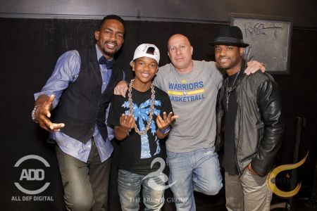 Bill Bellamy poses with Lorenz Tate, DJ Kiss and Steve Lobel.