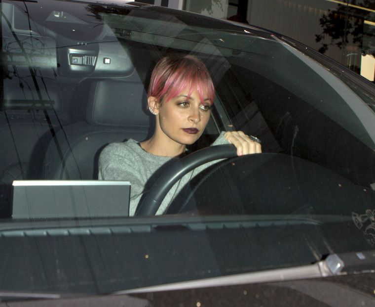 Nicole Richie and father Lionel were seen leaving Fred Segal after filming for Nicole’s Reality TV show in West Hollywood, CA.
