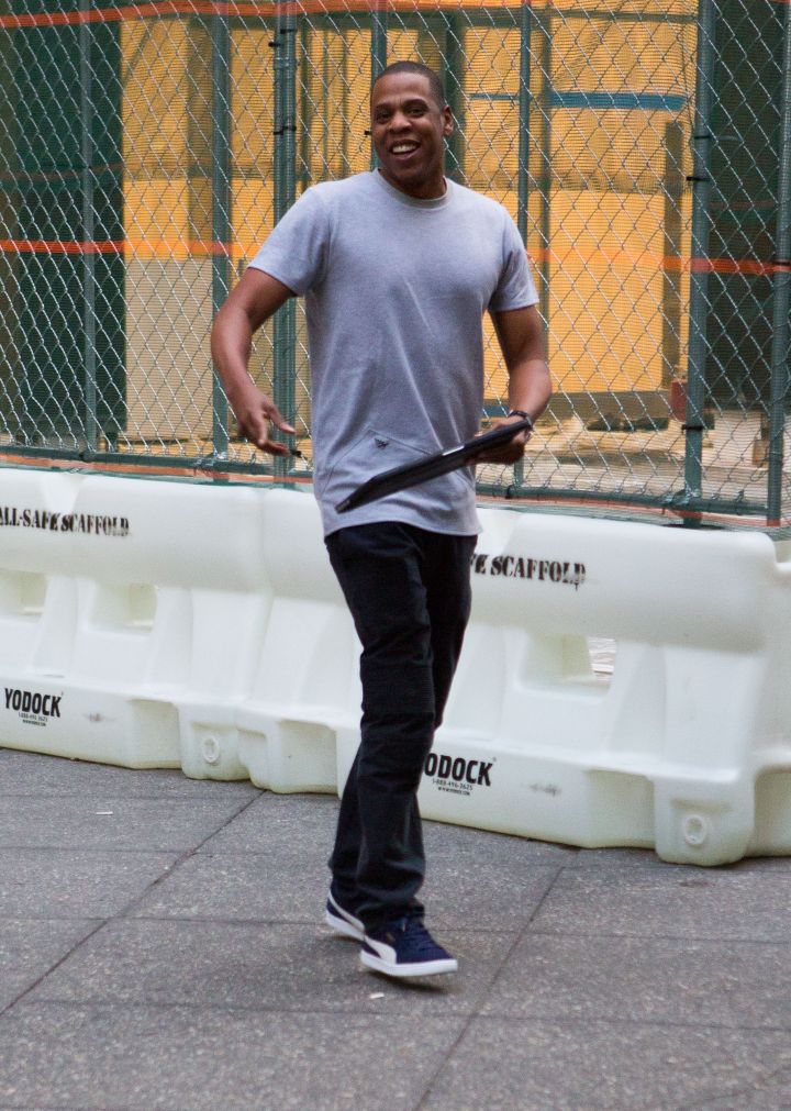 Jay Z was spotted leaving an office in NYC. He has every reason to smile and he knows it.