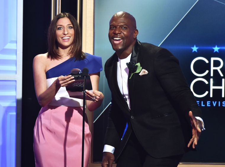 "Brooklyn Nine Nine" actors Chelsea Peretti and Terry Crews speak onstage at the 5th Annual Critics' Choice Television Awards at The Beverly Hilton Hotel.