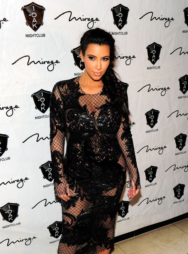 A pregnant Kim K. lets the world in on her and Kanye's secret.