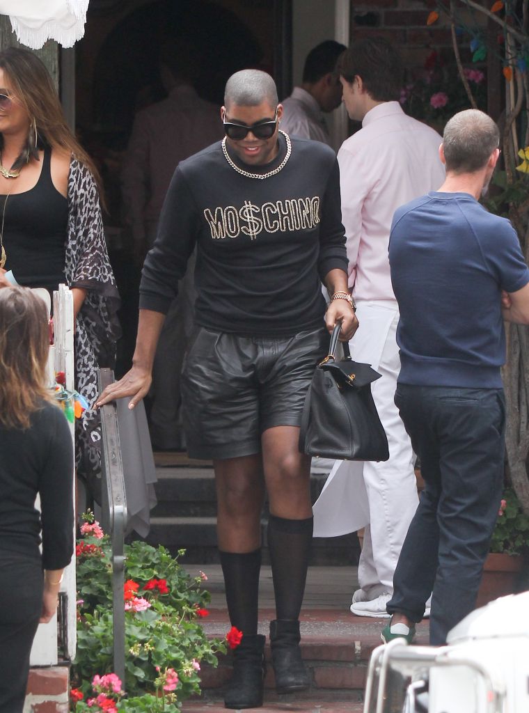 A much slimmer EJ Johnson is spotted in an all-black Moschino outfit. Werk.