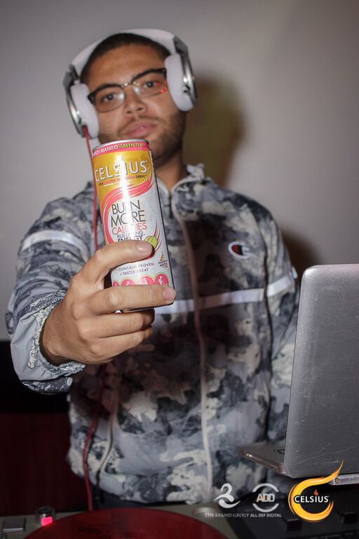 DJ Printz shows off his drink of choice – Celsius.