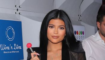 Kylie Jenner poses during the opening night of Sugar Factory in Miami