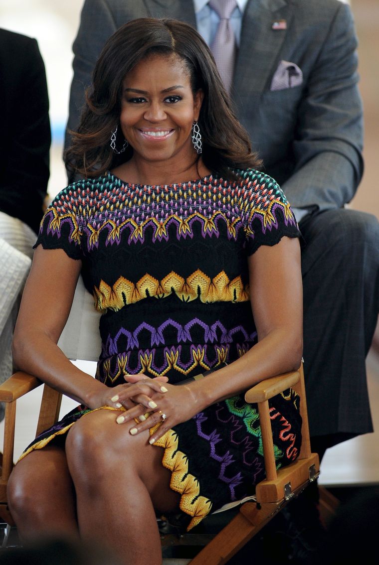 The First Lady attends a Q&A with college students. But our only question: where’s the dress from?