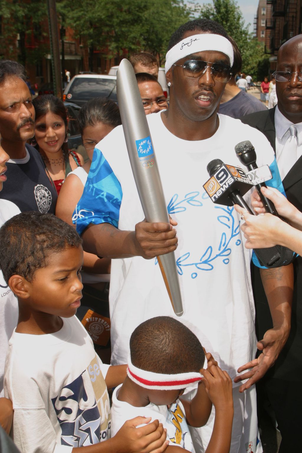 2004 Olympic Torch Relay - Sean 'P. Diddy' Combs in Queens