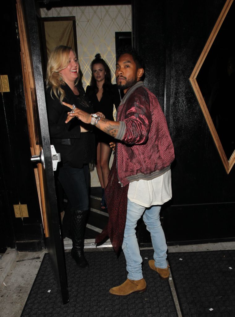 Miguel leaving Bootsy Bellows in West Hollywood kinda looks like Michael Jackson moonwalking out of a club.