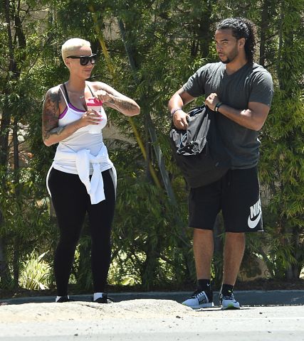 Amber Rose hiking with personal trainer