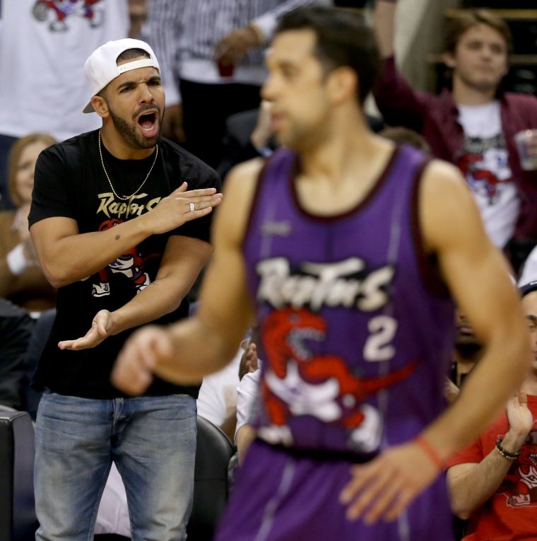 Drake cheers on the Raptors from the sidelines.