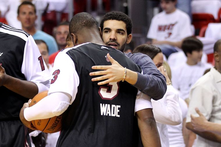 Drake and Dwyane Wade hug it out.