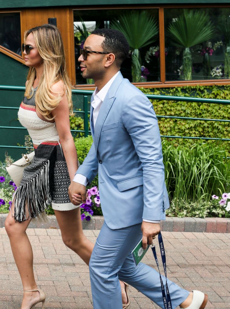 Chrissy Teigen and John Legend were spotted holding hands while arriving at Wimbledon.